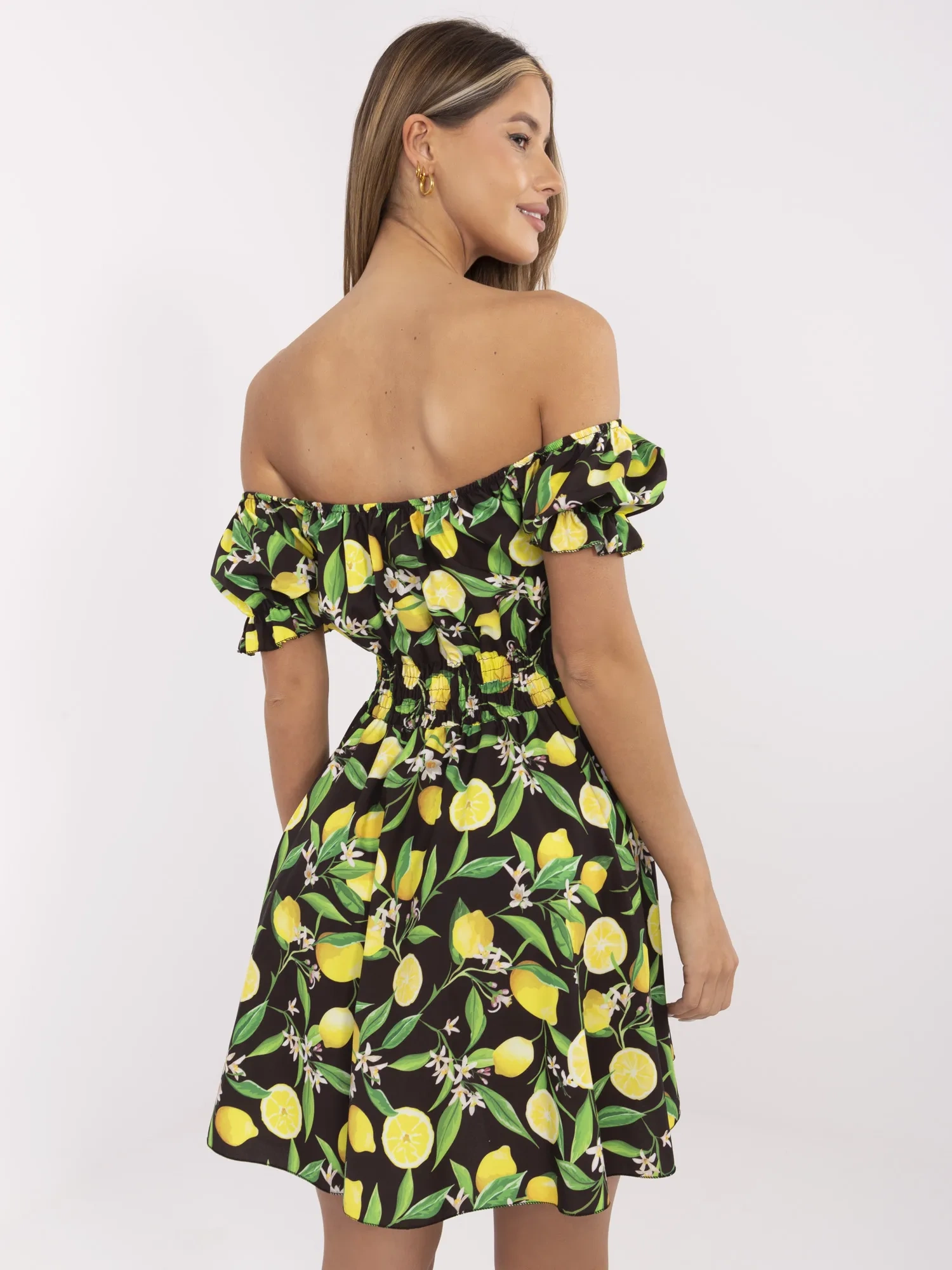Black-yellow flared off-the-shoulder dress.