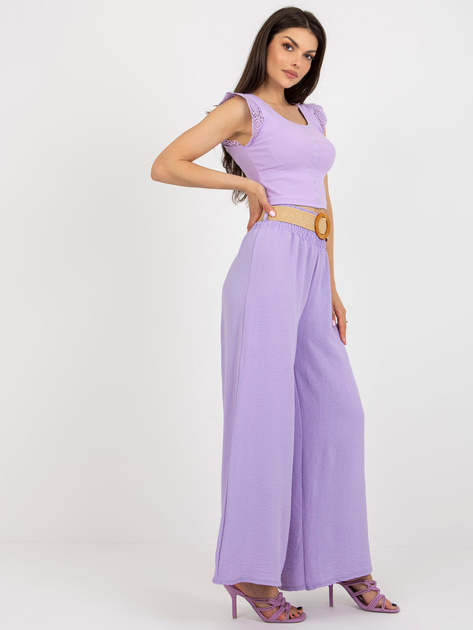 Hurtownia Jasnofioletowe zwiewne spodnie z materiału