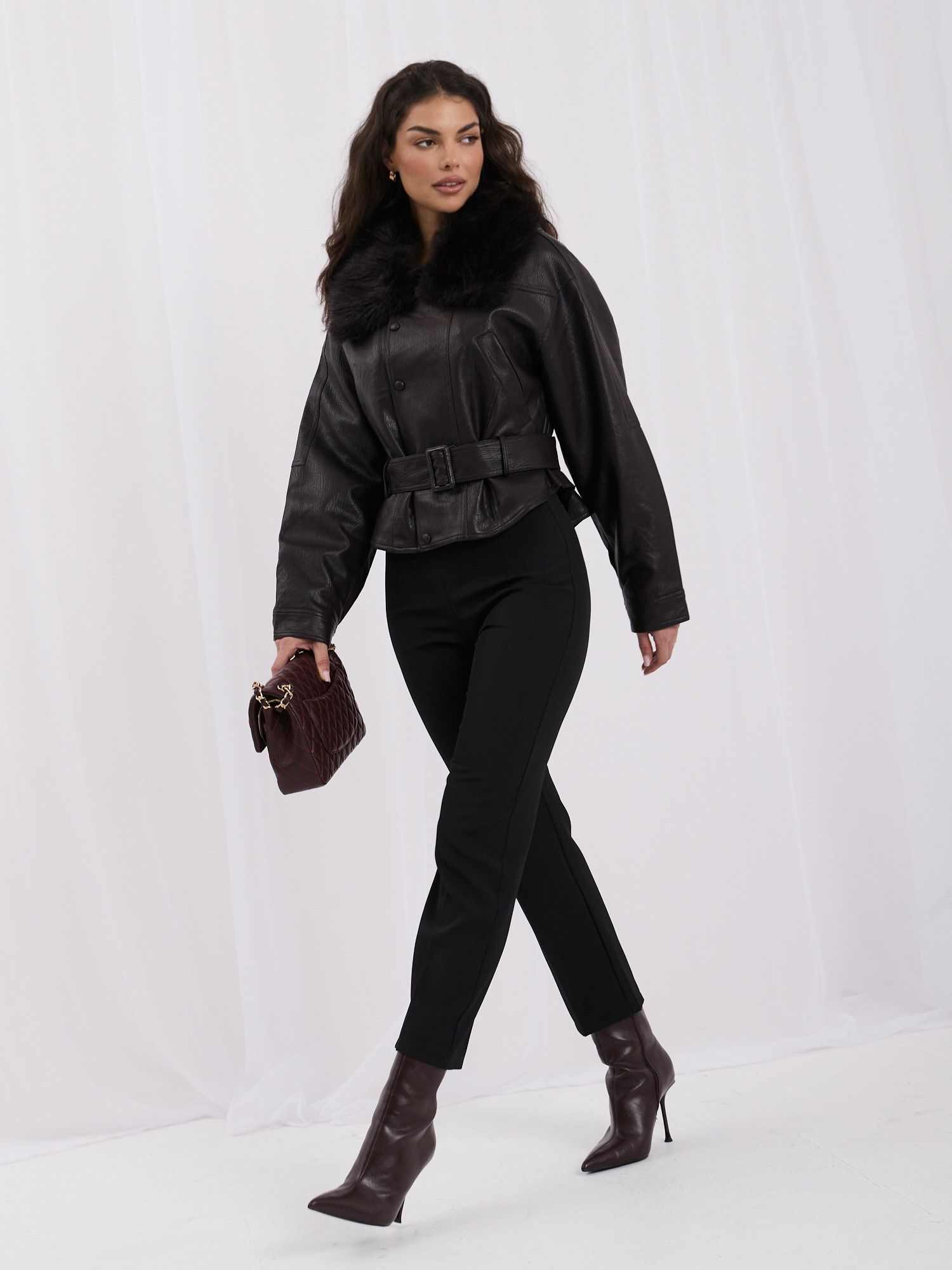 Chocolate faux leather jacket with detachable fur.