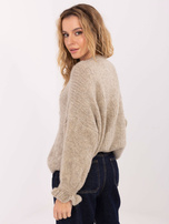 Beżowy kardigan z falbankami przy rękawach