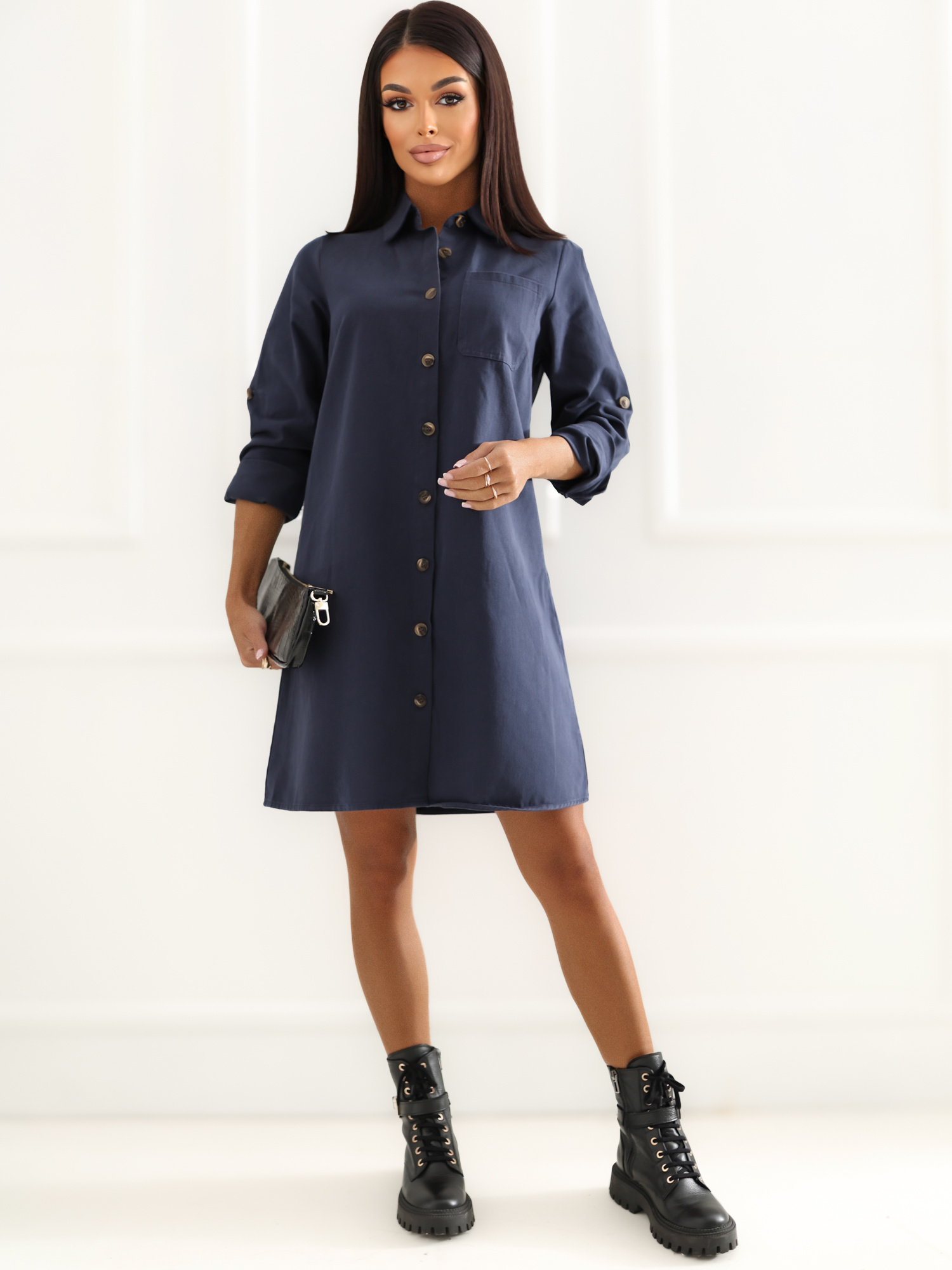 Navy blue denim dress with buttons.