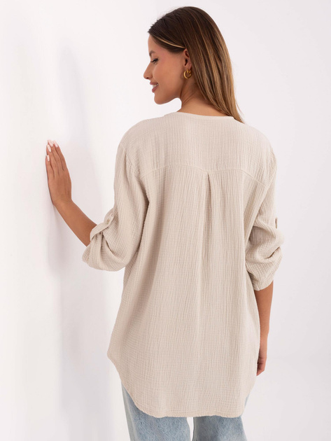 Hurtownia Beżowa muślinowa bluzka z dekoltem V