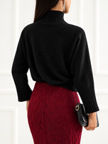 Schwarzer Damen Oversize-Pullover mit Rollkragen.