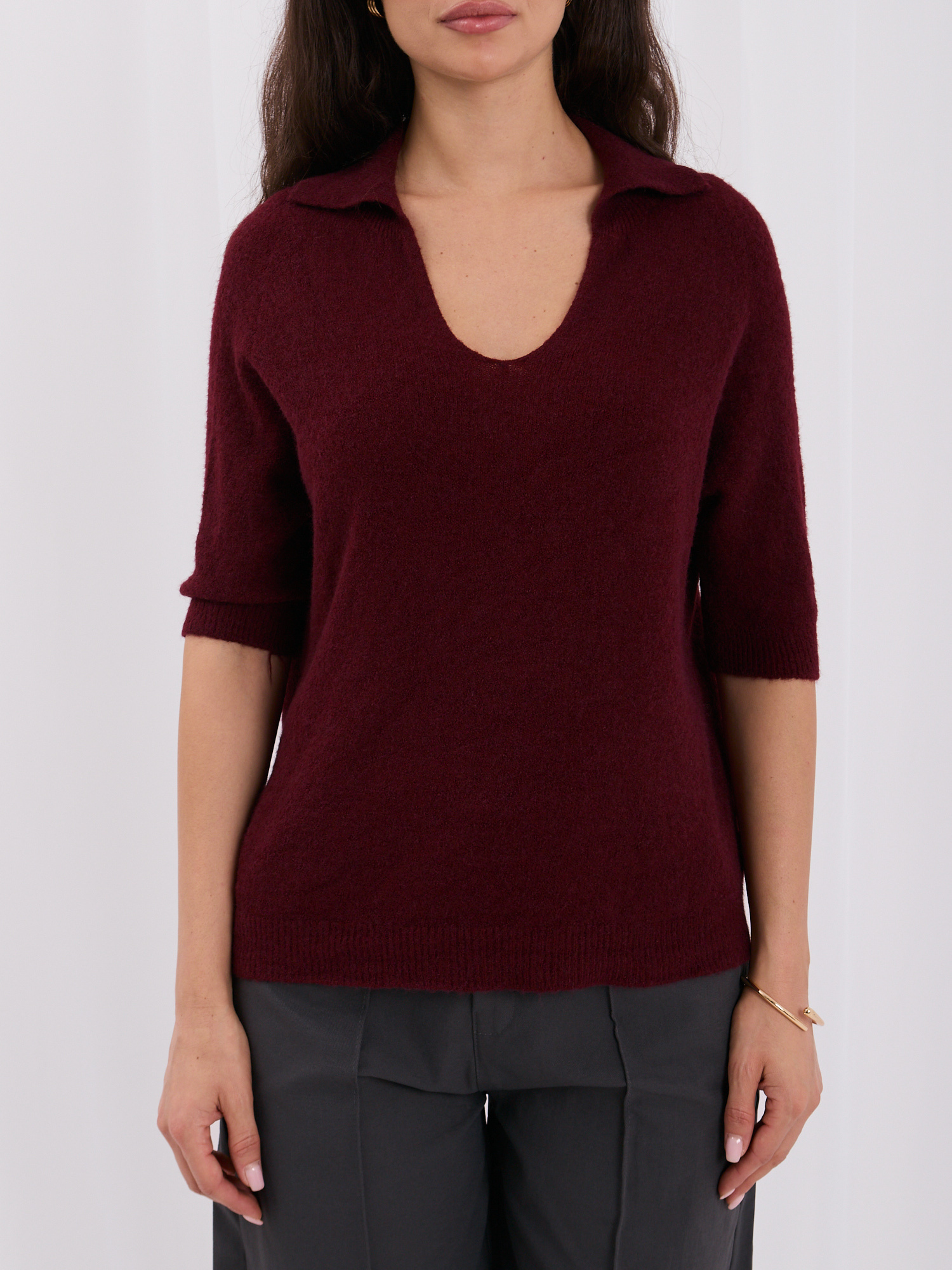 Burgundy women's polo sweater made of fluffy knitwear.