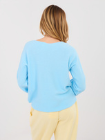 Pastel blue sweater with an alpaca blend.