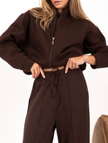 Chocolate zip-up sweatshirt with a bomber-style bottom.