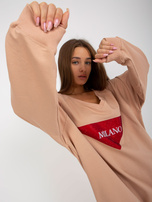 Hurt Bežinė ilga oversize palaidinė su aplikacija iš džetų.