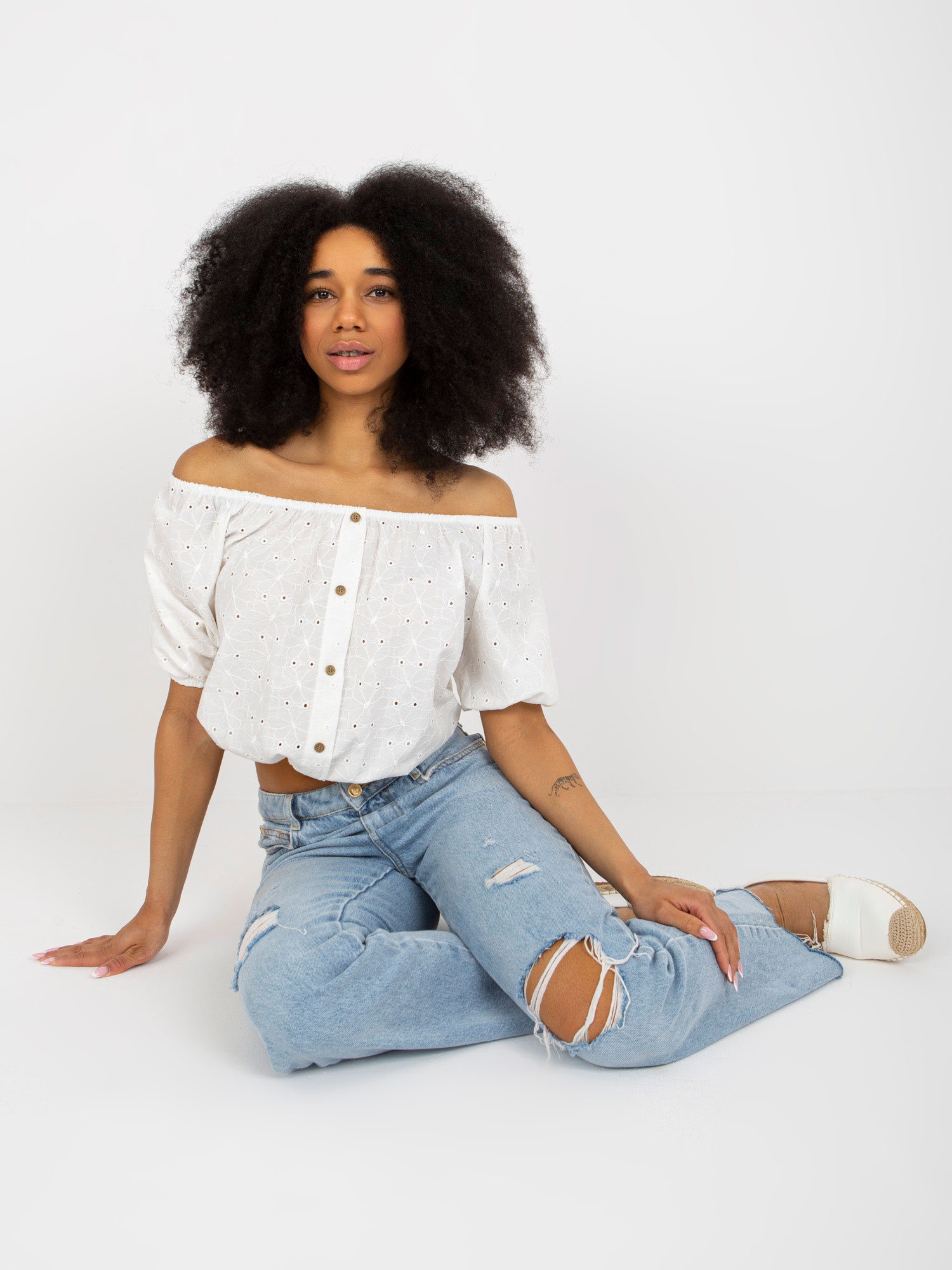 Ecru wholesale hollow blouse off-the-shoulder with buttons.