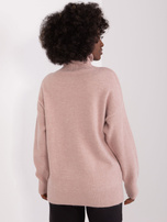 Hurt dusty pink sweater with a turtleneck and ribbed cuffs.