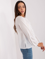 Hurt Ecru women's blouse with an application.