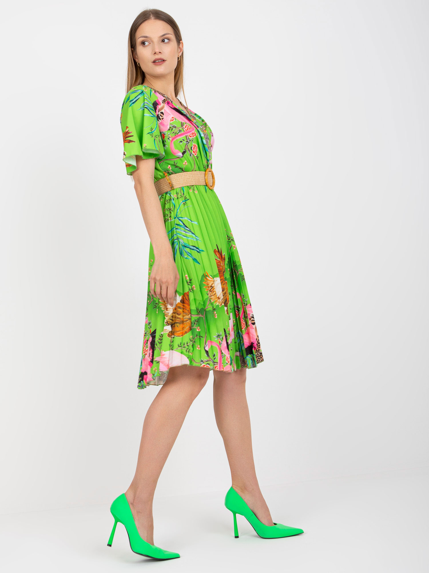 Light green dress with prints and braided belt 