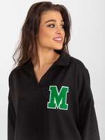 Hurtownia Czarna bawełniana bluzka oversize z naszywką