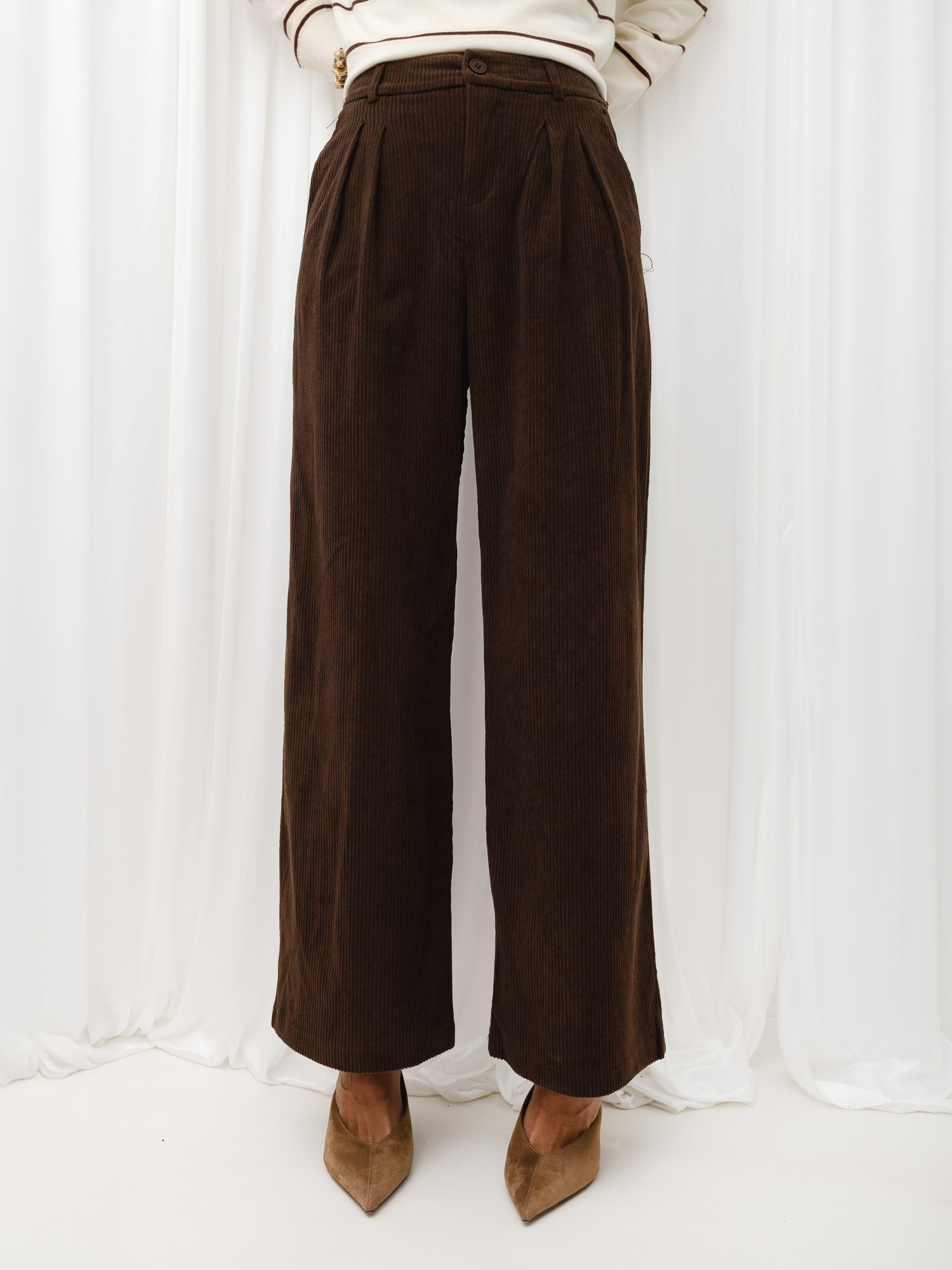 Brown corduroy dress pants with pleats.