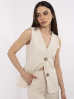 Beżowy damski garnitur z dużymi guzikami 