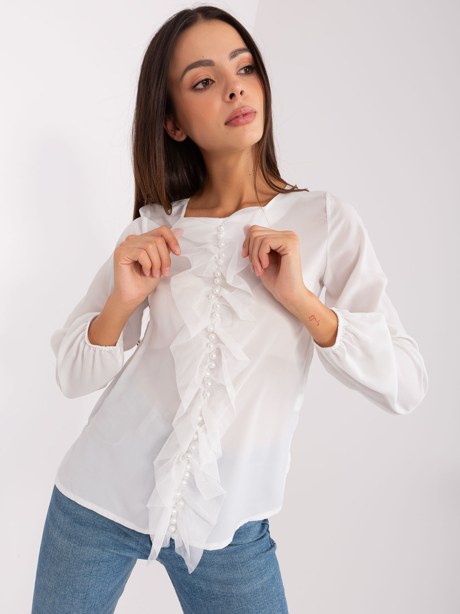 Hurt Ecru women's blouse with an application.