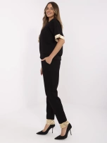 Czarny dwuczęściowy komplet ze złotymi wstawkami