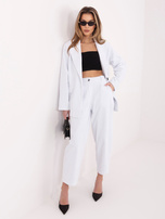 Białe sztruksowe spodnie z zakładkami RUE PARIS