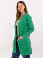 Green cardigan with long sleeves.