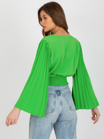 Hurtownia Jasnozielona bluzka wizytowa z plisowaniem