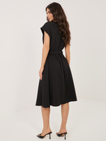Black midi dress with short sleeves.