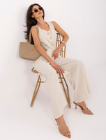 Jasnobeżowy elegancki komplet z szerokimi spodniami