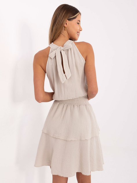 Beżowa rozkloszowana sukienka z muślinu