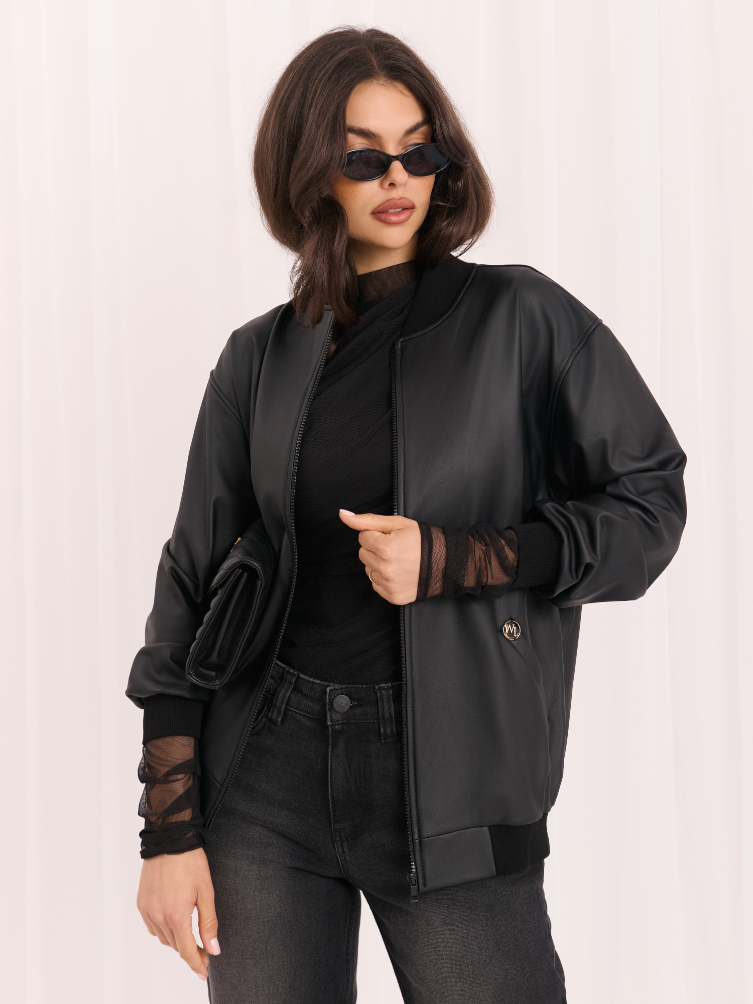 Black leather jacket with velvet lining.