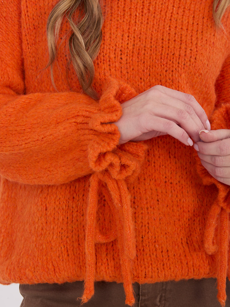 Pomarańczowy sweter oversize ze ściągaczami