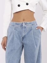 Blue women's baggy jeans with pockets.