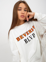 Hurtownia Ecru luźna bluza z nadrukiem i aplikacją