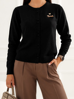 Black short cardigan with dachshund embroidery.
