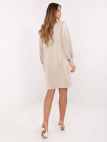 Jasnobeżowa dresowa sukienka o kroju oversize