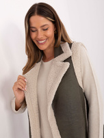 Khaki women's vest with sheepskin.