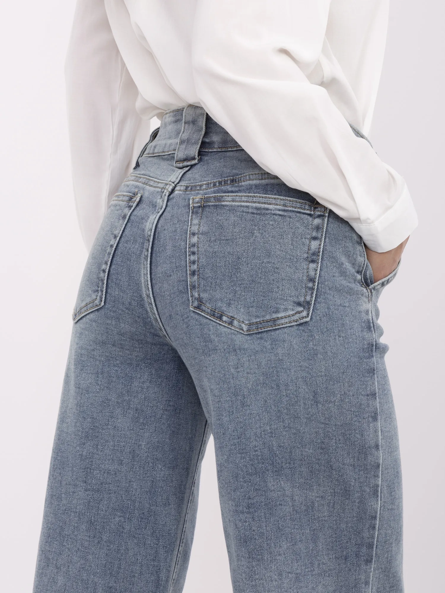 Blue long women's dad fit jeans.