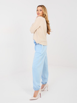 Pastelowe niebieskie dresowe spodnie ze ściągaczami