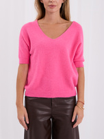 Pink fluffy basic sweater with a V-neck.