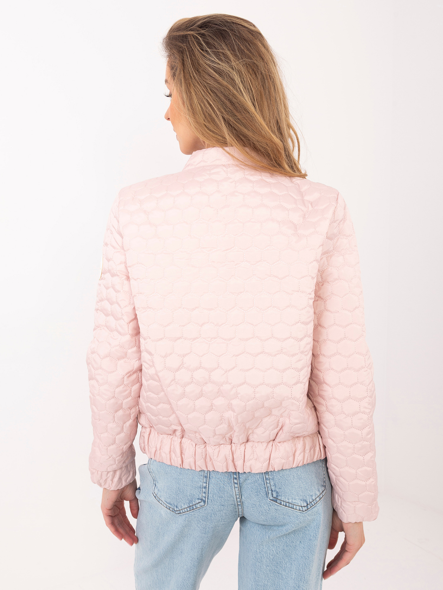 Jasnoróżowa przejściowa kurtka z suwakiem