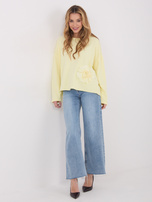 Jasnożółta bluza z kwiatową aplikacją