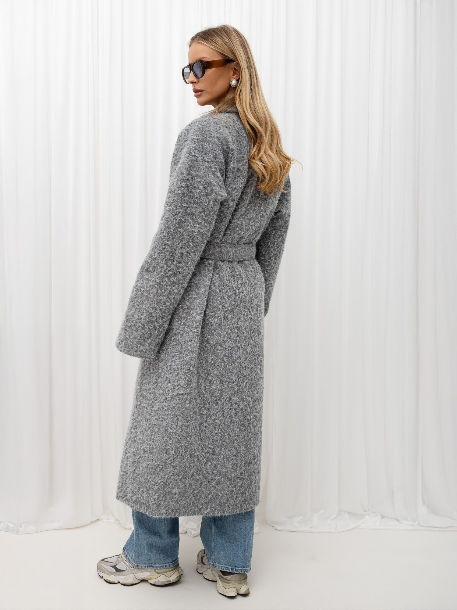 Gray double-breasted boucle coat made of wool.