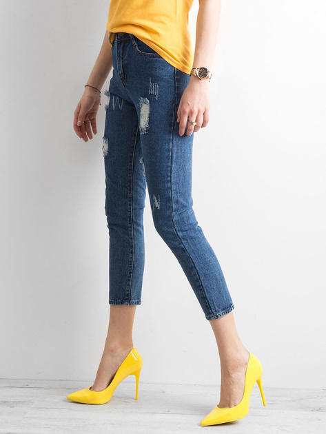 Ciemnoniebieskie spodnie ankle jeans z przetarciami