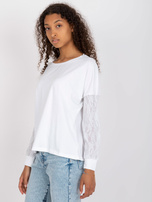 Weiße Bluse mit Spitzenärmeln Shantelle RUE PARIS.
