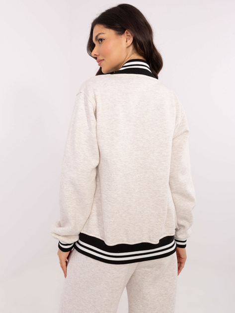 Hurt Jasnobeżowa melanżowa bluza bomberka z naszywką