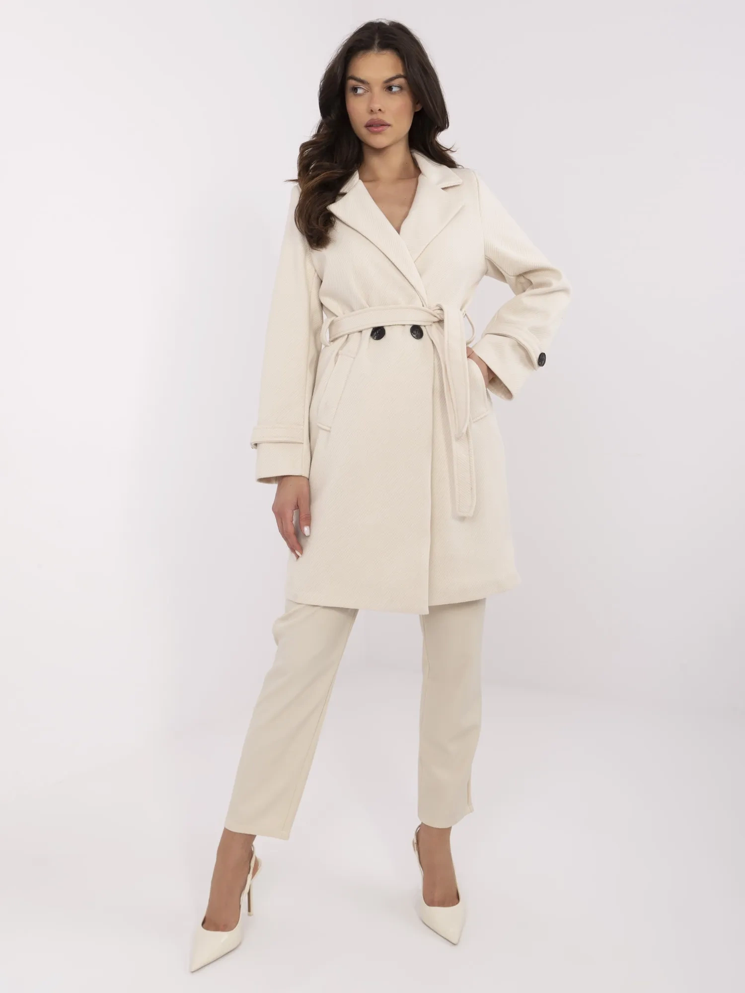 Light beige women's knee-length coat.