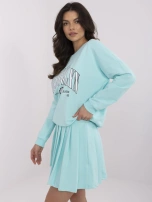 Miętowy damski komplet z bluzą z nadrukiem