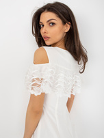 Hurt Ecru cocktail dress with off-the-shoulder sleeves.