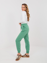 Pistacjowe ocieplane spodnie basic z kieszeniami