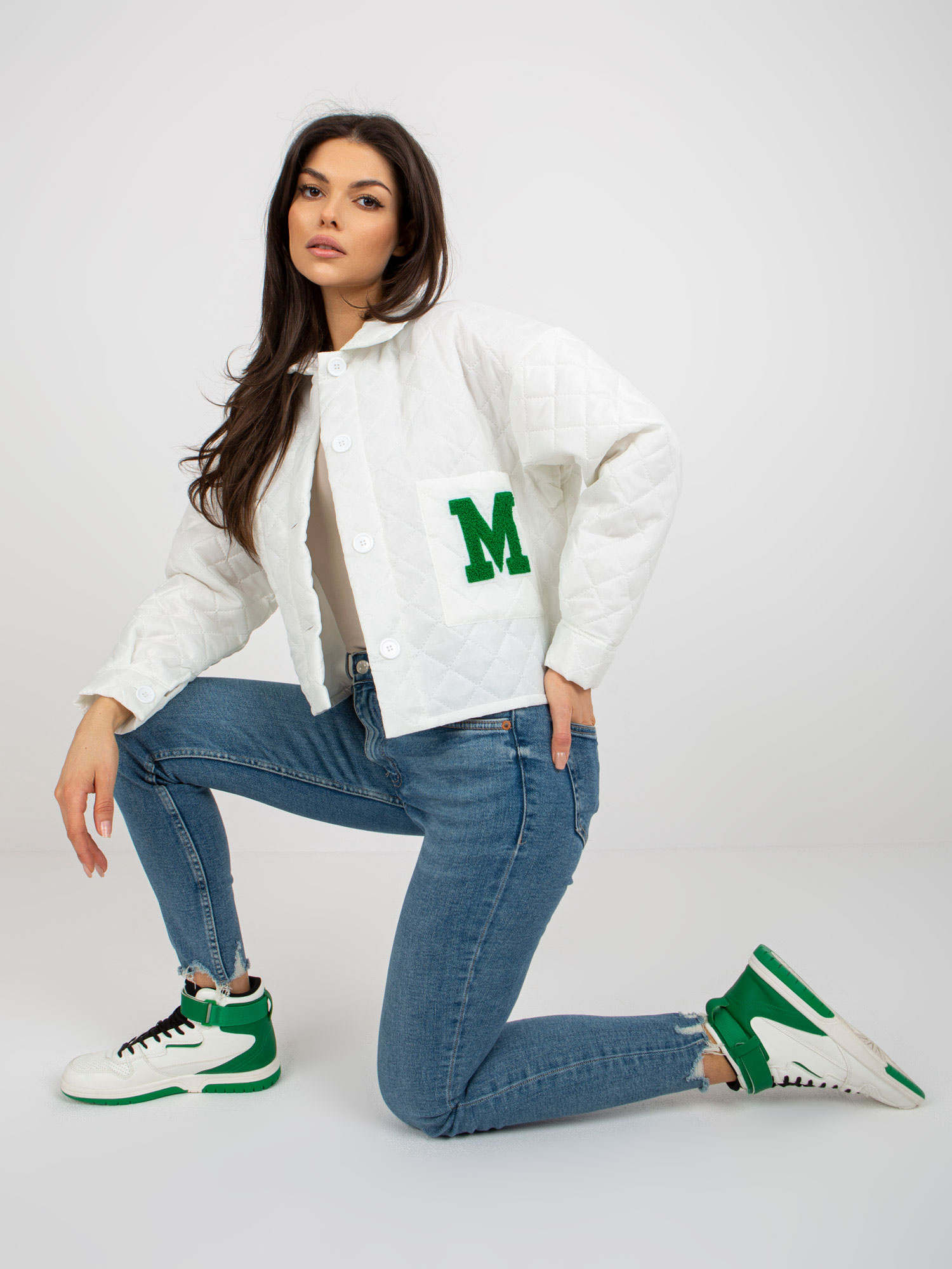 Wholesale Ecru quilted transitional jacket with patch.