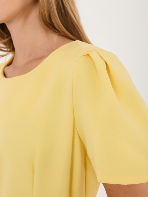 Żółta rozkloszowana sukienka z paskiem