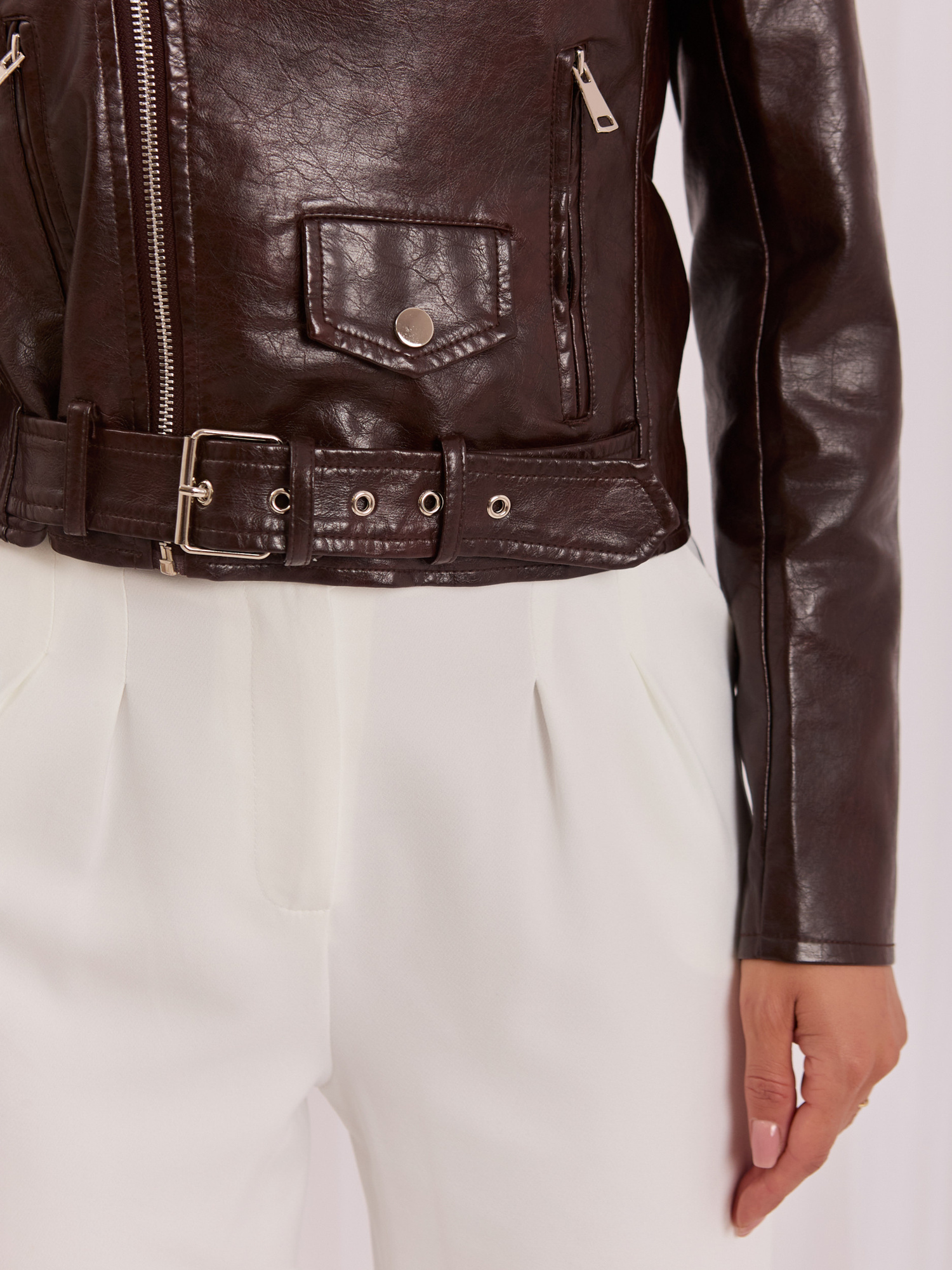 Dark brown women's faux leather biker jacket.