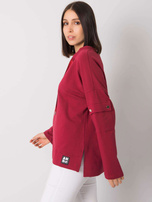 Bordowa bluzka plus size z kieszenią na rękawie Lunnara